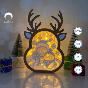 Lanterna a forma di pupazzo di neve e renna per decorazioni natalizie, scatola con ombra a forma di renna in formato SVG per progetti Cricut fai da te 2
