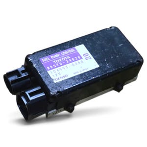 May include: A black rectangular Toyota fuel pump control module with two electrical connectors on one end. A white label on the top surface displays the text FUEL PUMP CONTROL, TOYOTA 89570-34020, 104993-0460, 12V, DENSO, and MADE IN JAPAN.