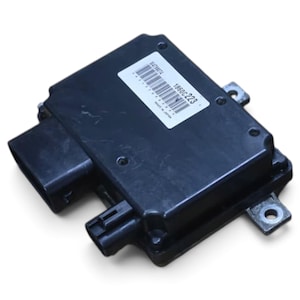 May include: A black rectangular electronic control unit module featuring a white label with a barcode and the printed text 1860C223. The device has a plastic casing, a large connector port on one side, and two metal mounting tabs with holes.