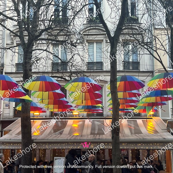 Rainbow umbrellas over Paris cafe