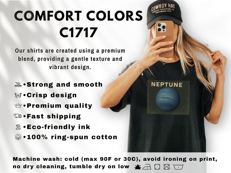 May include: Black t-shirt with a Neptune graphic. The shirt features the text "NEPTUNE" above a blue planet image. The image also includes the text "COMFORT COLORS C1717" and washing instructions.