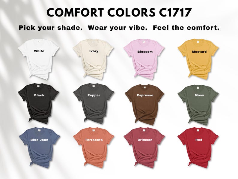 May include: A display of Comfort Colors C1717 t-shirts in various colors, including white, ivory, blossom, mustard, black, pepper, espresso, moss, blue jean, terracotta, crimson, and red. The text "Pick your shade. Wear your vibe. Feel the comfort." is at the top.