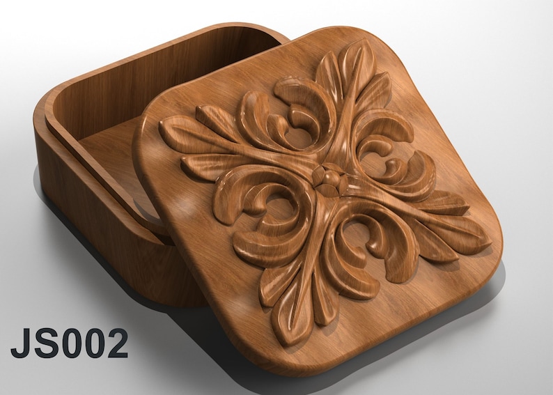 May include: A wooden box with a carved floral design on the lid. The box is open and the inside is visible. The box is labeled "JS002".