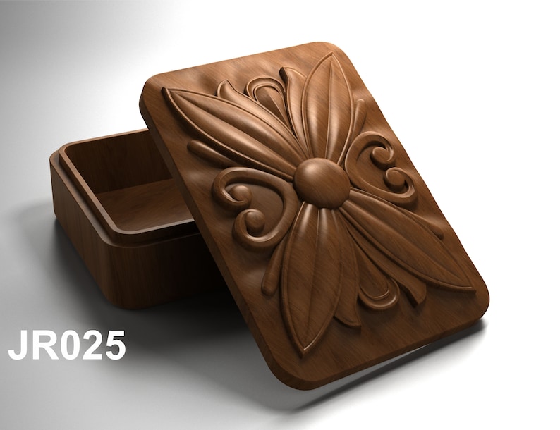 May include: A wooden box with a carved floral design on the lid. The lid is open and the inside of the box is empty. The box is labeled "JR025".