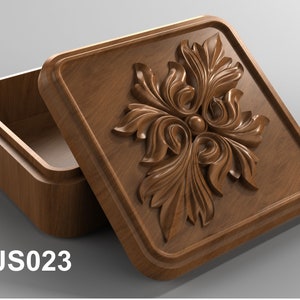 May include: A wooden box with a carved floral design on the lid. The box is open and the inside is visible. The box is labeled "JS023".