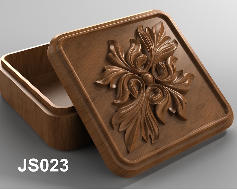 May include: A wooden box with a carved floral design on the lid. The box is open and the inside is visible. The box is labeled "JS023".
