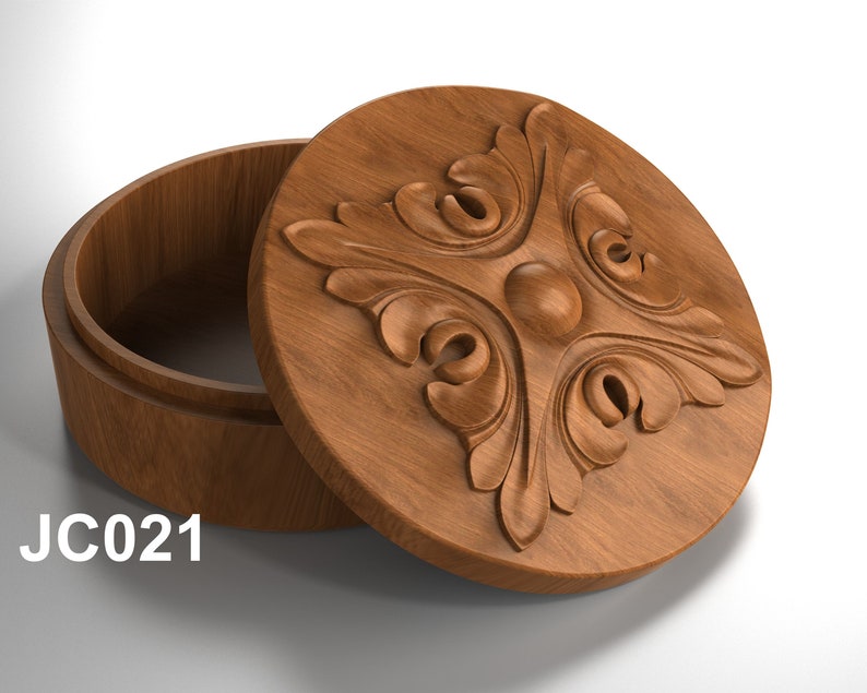 May include: A wooden box with a carved floral design on the lid. The box is open and the inside is visible. The box is labeled "JC021".