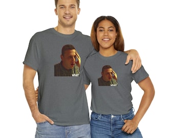 May include: Two people wearing charcoal grey t-shirts with a printed image of a man with his hand on his forehead and the word "what?" printed below the image.