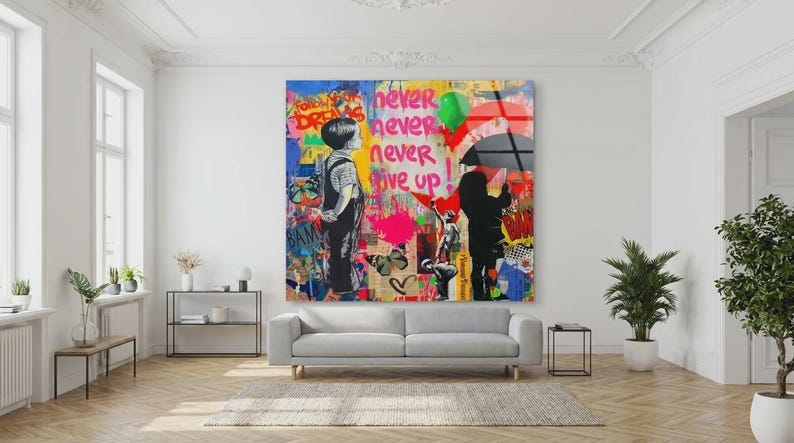 May include: A large, colorful wall art piece with graffiti-style art. The artwork features two children, one looking up and the other holding an umbrella. Text includes "Never Give Up" and "Follow Your Dreams."