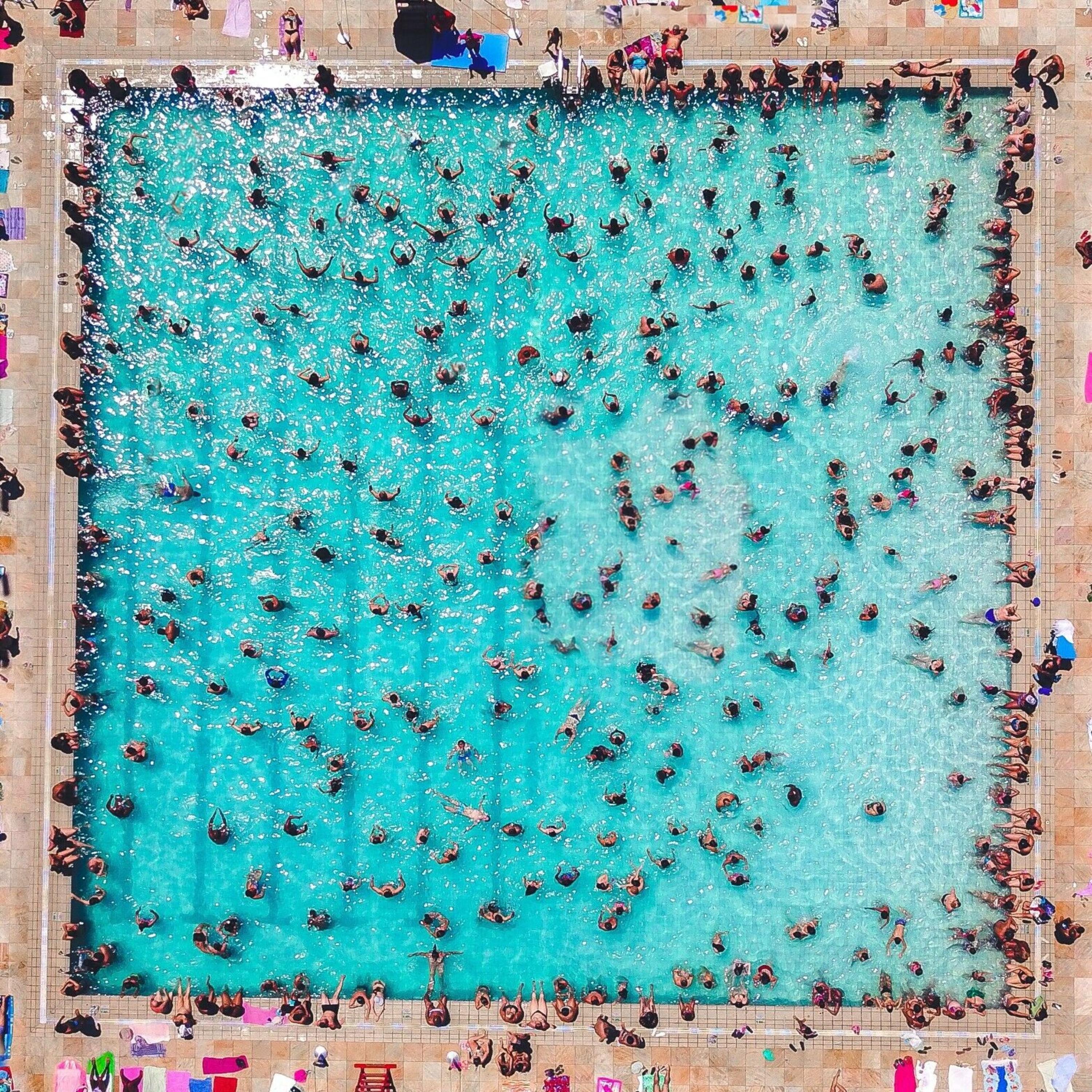 Tiny people swimming pool drone photography acrylic glass pictures XXL pictures photography water swimming small people photography from above