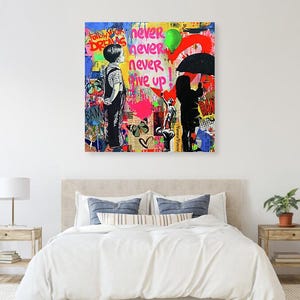 May include: Colorful pop art style canvas print featuring a boy looking up, a person with an umbrella, and the words "never never give up". The artwork includes butterflies, a heart, and a green balloon.