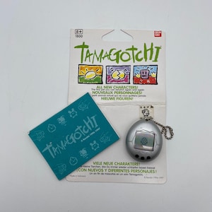 RARE Vintage Tamagotchi 1997 Mame Game De Hakken White RARE Vintage Tamagotchi 1997 Mame Game De Hakken White