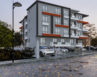 May include: A modern apartment building with a grey exterior and orange accents. The building has multiple floors and balconies. There are several cars parked in front of the building.