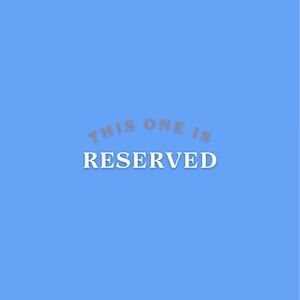 May include: A light blue background with the text "THIS ONE IS RESERVED" in white, with a shadow effect. The text is centered on the image.