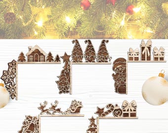 May include: Wooden Christmas-themed corner decorations featuring various designs, including gnomes, Santa, presents, and a snowflake. The decorations are brown with intricate cut-out details, perfect for holiday crafting or decor.