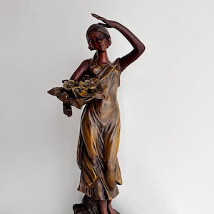 Sculpture &quot;Girl with a Basket of Flowers&quot;