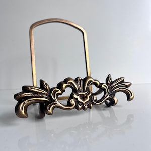 Antique bronze plate and picture stand in the Rococo style early 20th century richly decorated easel Bronze icon stand Louis XIV style, gift