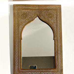 Moroccan brass mirror, arched wall mirror with engraved floral details, signed backplate, Islamic design, mid-century oriental wall decor