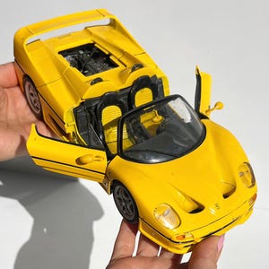 Ferrari F50 diecast model car, Maisto 1 18 scale collectible, yellow sports car replica, hand assembled detail, rare collector piece, gift