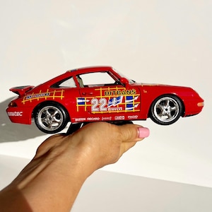 Porsche 911 Supercup diecast model car, Bburago 1:18 collectible, racing livery, opening parts, rare motorsport gift, Italy, display piece