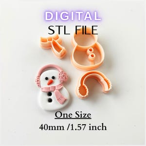 May include: A digital STL file for a snowman-themed design. The image shows a snowman with a pink scarf and earmuffs, along with several orange cookie cutters. The text on the image says "DIGITAL STL FILE" and "One Size 40mm / 1.57 inch".