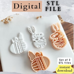 Op de afbeelding: Vier paas-thema koekjessnijders. Twee witte en twee perzik-gekleurde snijders zijn gevormd als konijntjes en paaseieren. De afbeelding bevat de tekst "Digital STL File" en "Set of 2 STL files instant download".