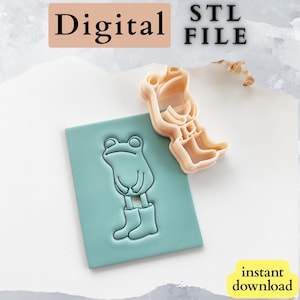 Könnte beinhalten: Ein hellbrauner Frosch-Ausstecher neben einem rechteckigen Stempel in Türkis mit einem Froschdesign. Das Bild enthält auch die Wörter "Digital STL File" und "instant download".