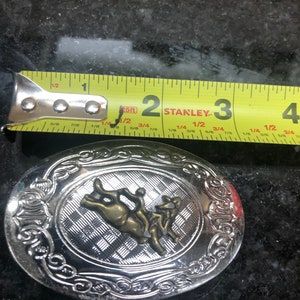 Belt buckle of bull rider