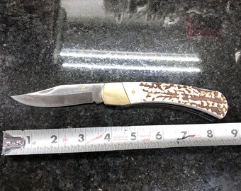 knife folding knife with sheath mossy oak marked on blade very sharp and clean knife