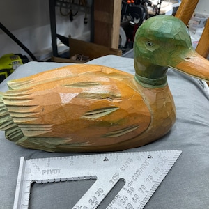 Decoy wooden duck and one wooden goose decoration piece