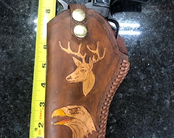 leather revolver holster left handed hand made by myself hand carved leather fit small to medium size 4 inch barrel revolvers