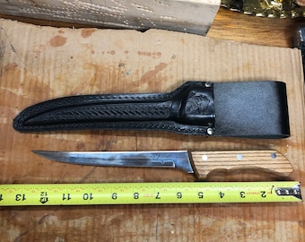 Knife King Fisher brand fillet knife stainless steel with a great sheath made of leather very very sharp mirror finish