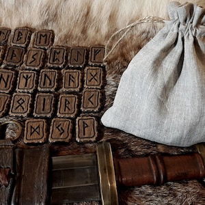 Elder Futhark runes in a linen pouch (1000 year old oak wood)