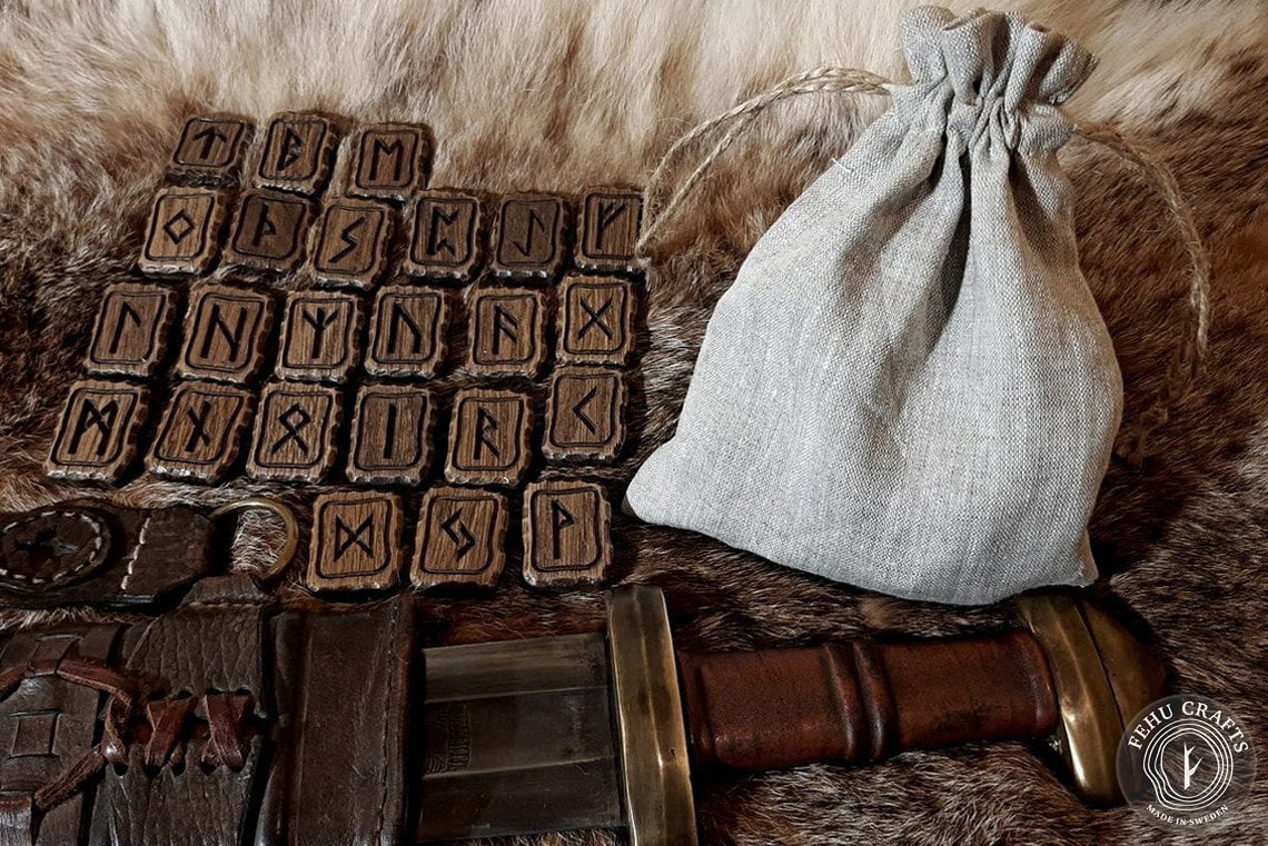 Elder Futhark runes in a linen pouch (1000 year old oak wood)