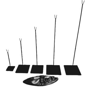 May include: Set of five black metal display stands with varying heights. Each stand has a square base and a single upright rod with a forked top.