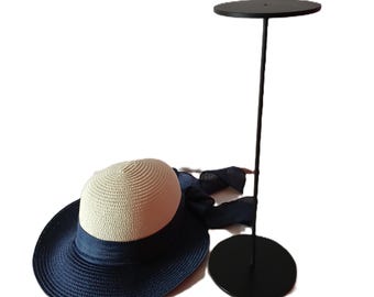 Display stand, hat stand.