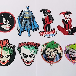 Puede incluir: Una colección de parches bordados con personajes de DC Comics. Incluye Batman, Catwoman, Harley Quinn y The Joker. Los parches son coloridos y detallados, con textos como "Harley Quinn" y "Why So Serious?"