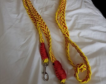 Red and yellow handwoven paracord reins