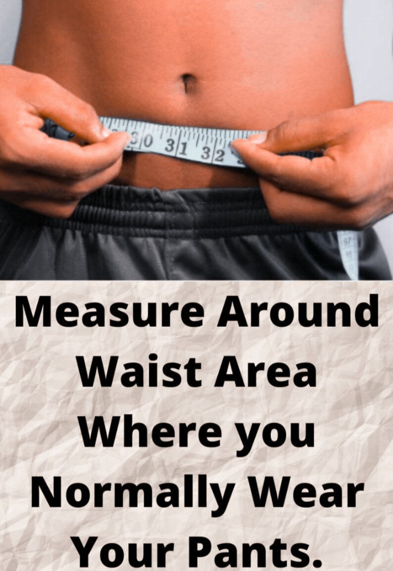May include: A person's waist is measured with a measuring tape. The tape reads between 30 and 32 inches. The text in the image reads: "Measure Around Waist Area Where you Normally Wear Your Pants."