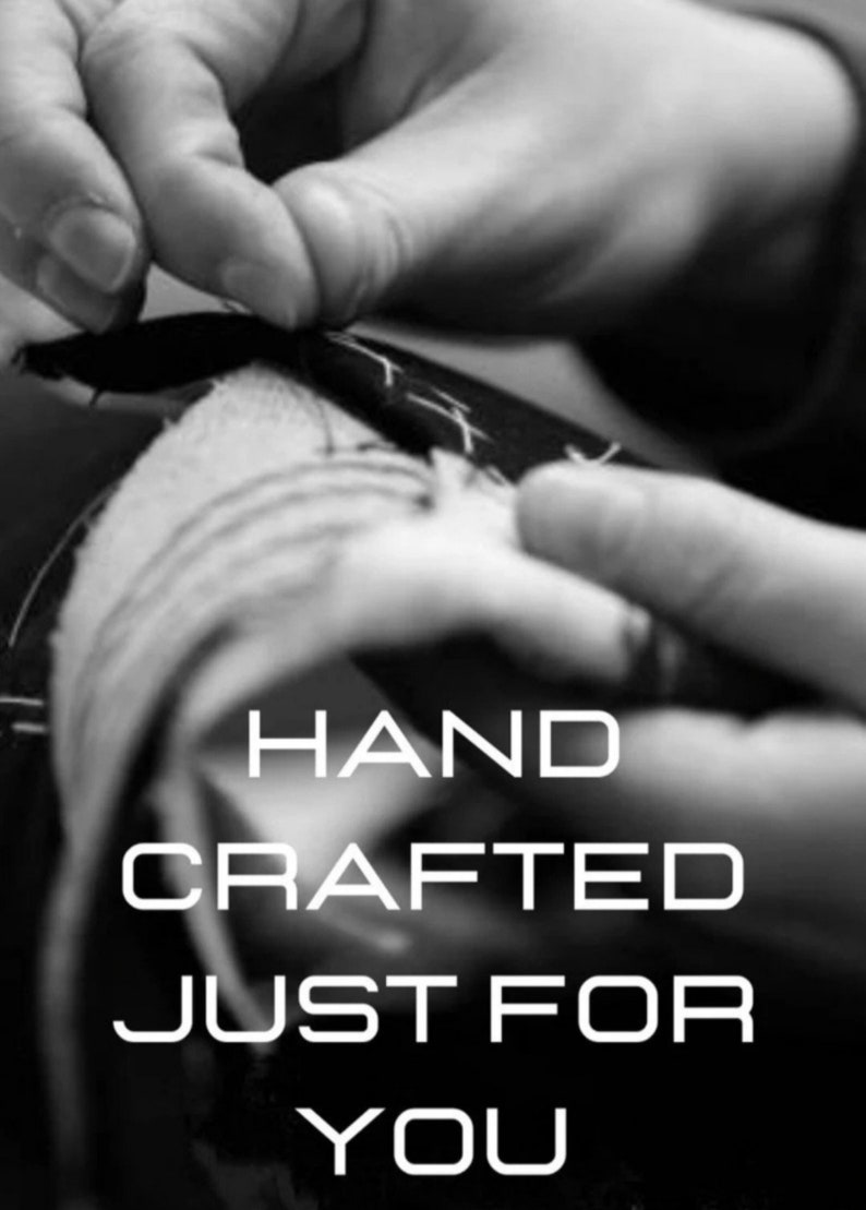 May include: Black and white image of hands sewing fabric. The text "HAND CRAFTED JUST FOR YOU" is displayed in white, bold letters. The image highlights the craftsmanship and personalized nature of the product.