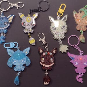 Eeveelution Pocket Monster Keychains, Phone Grips, and Badge Reels (Made to Order) Anime, Video Games
