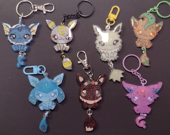 Llaveros, fundas para teléfono y porta-chapas de Monstruos de Bolsillo de Eeveelution (hechos a medida) Anime, videojuegos