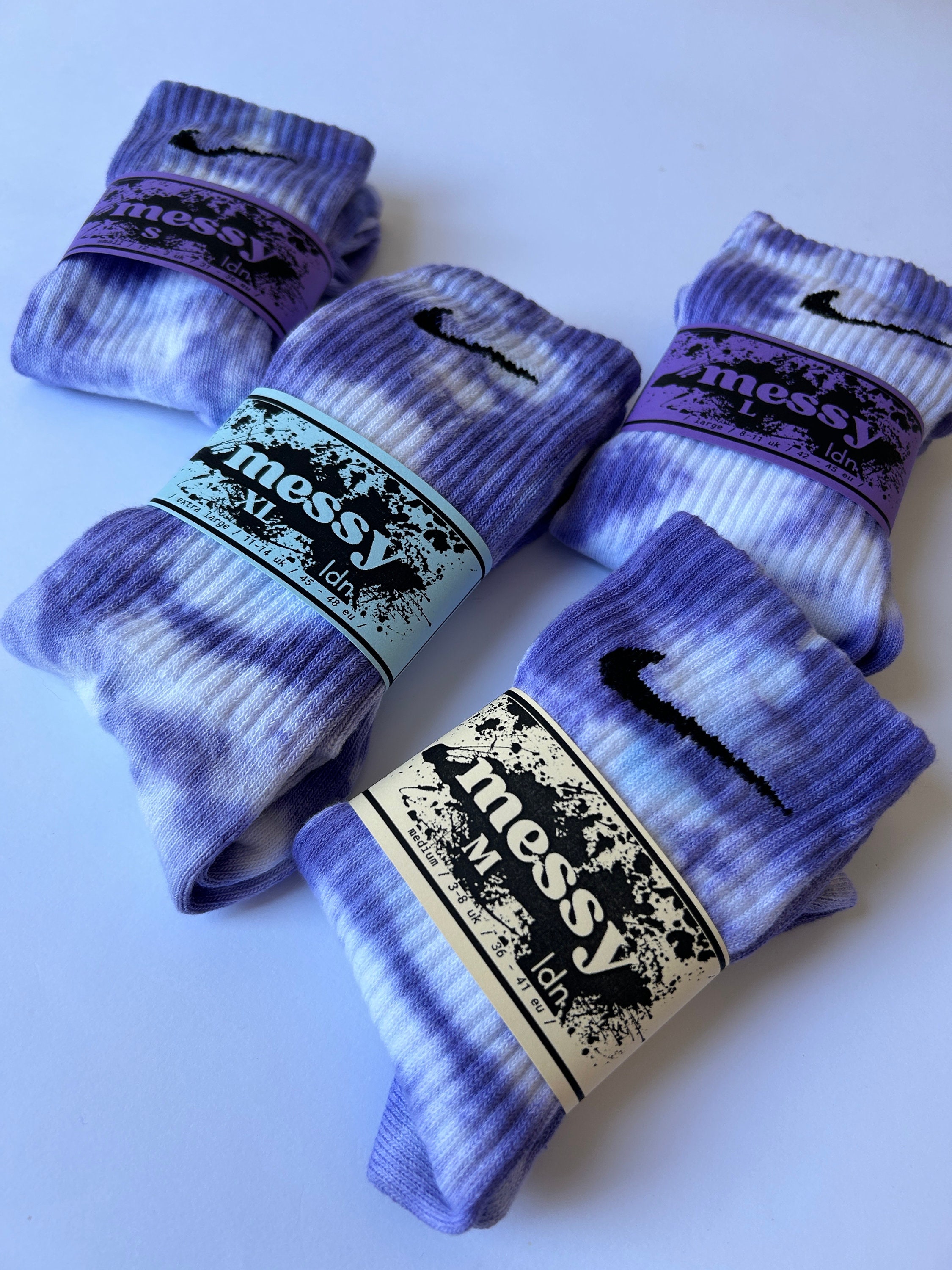 white and purple nike socks