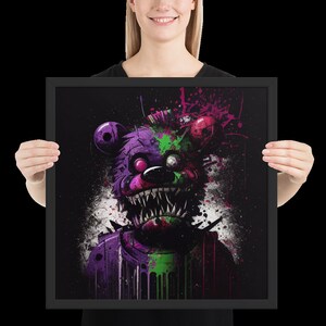 May include: A framed print of a purple and green cartoon bear with sharp teeth and a menacing expression. The bear is covered in paint splatters and has a robotic appearance.
