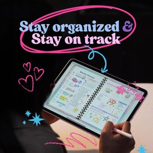 May include: A digital weekly planner displayed on a tablet, with colorful notes and doodles. The text "Stay organized & Stay on track" is written above the tablet. A hand is holding a stylus, and there are pink hearts and stars drawn around the tablet.