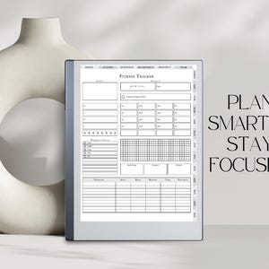 May include: A black and white printable fitness tracker with the text "Fitness Tracker" and "Plan Smarter, Stay Focused!"  The tracker includes sections for daily, weekly, monthly, quarterly, and yearly goals.
