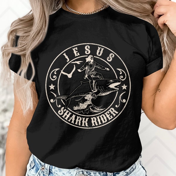 Jesus Shark Rider T-Shirt, Jesus Surfing Ocean Waves Graphic Tee, Casual Religious Humor Top, Unique Gift Idea