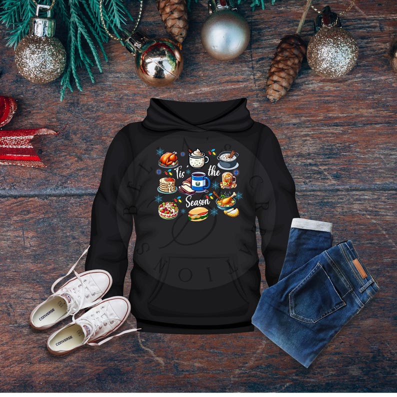 May include: Black hoodie with a white graphic of holiday food and the text "Tis the Season".