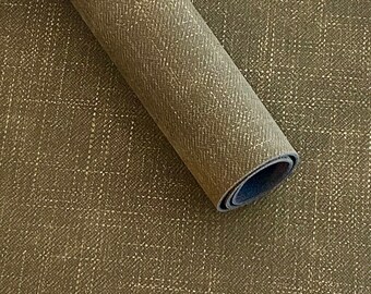 May include: A roll of brown fabric with a subtle gold shimmer and a woven texture.
