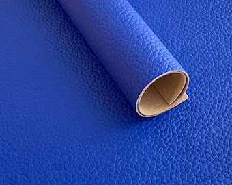 May include: A roll of blue faux leather with a textured surface.
